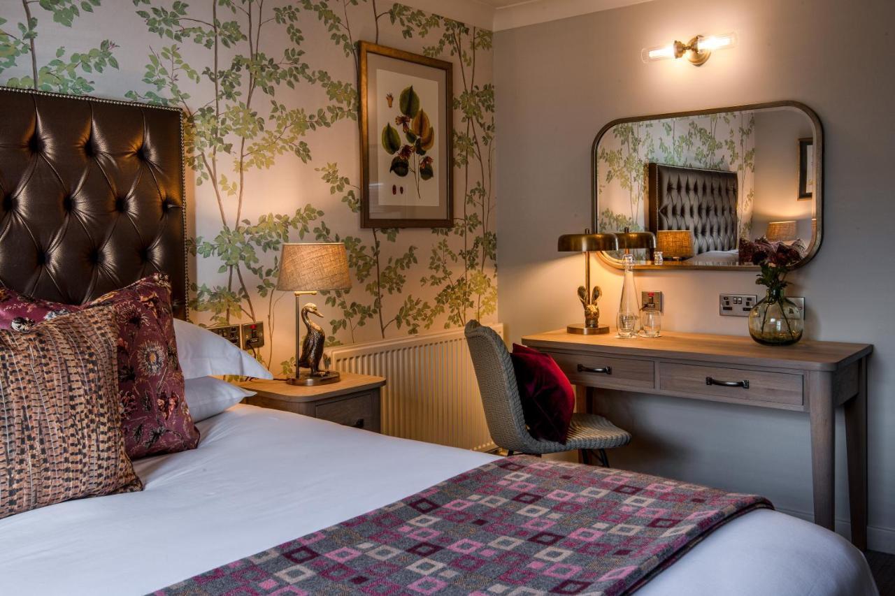 布莱克本 The Millstone, Mellor酒店 外观 照片 A bedroom at The Swan