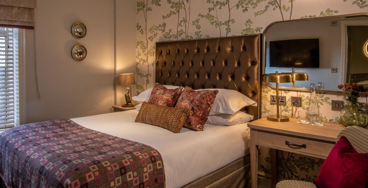 布莱克本 The Millstone, Mellor酒店 外观 照片 A bedroom at The Swan